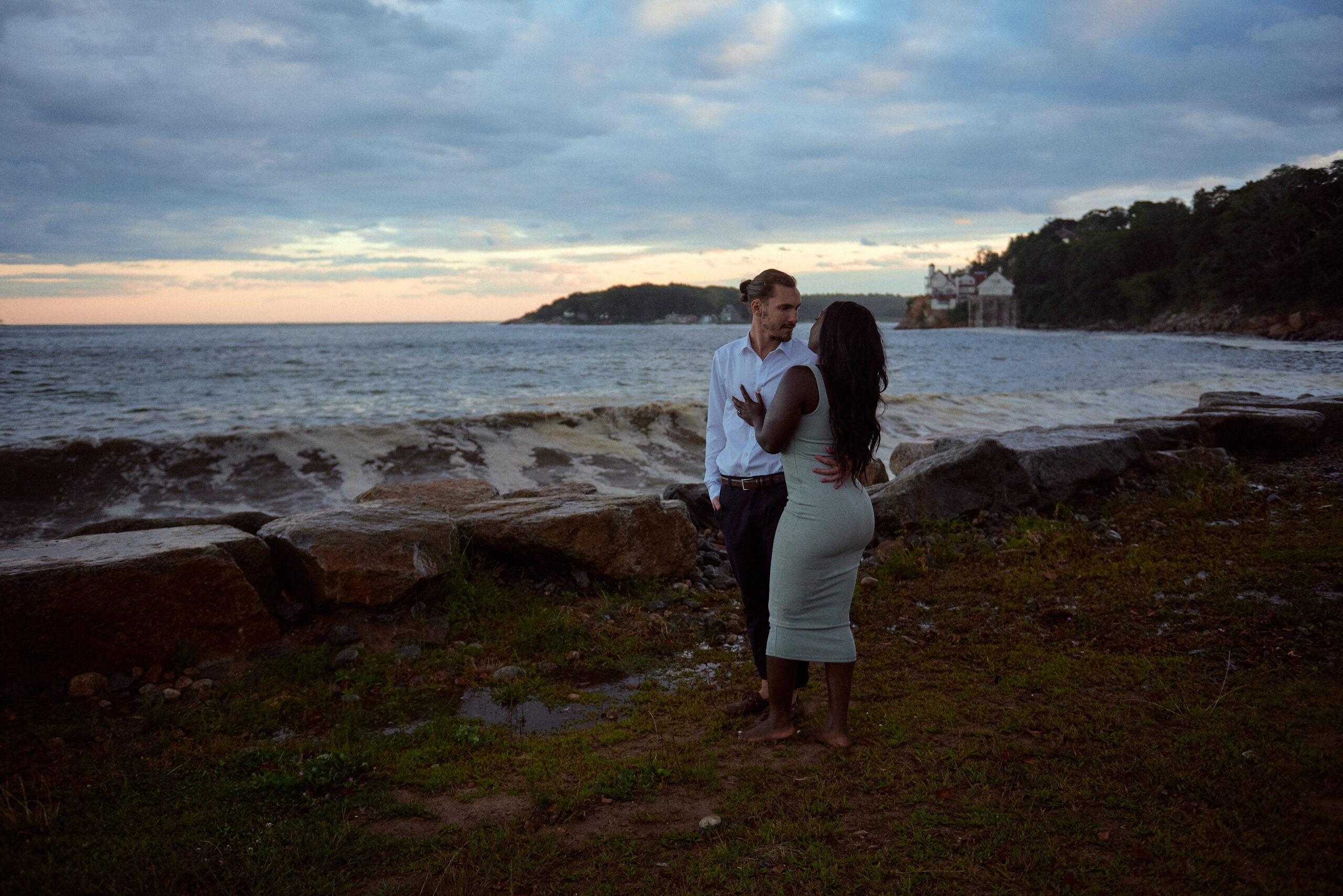 Couple on the beach during engagement photoshoot in Boston